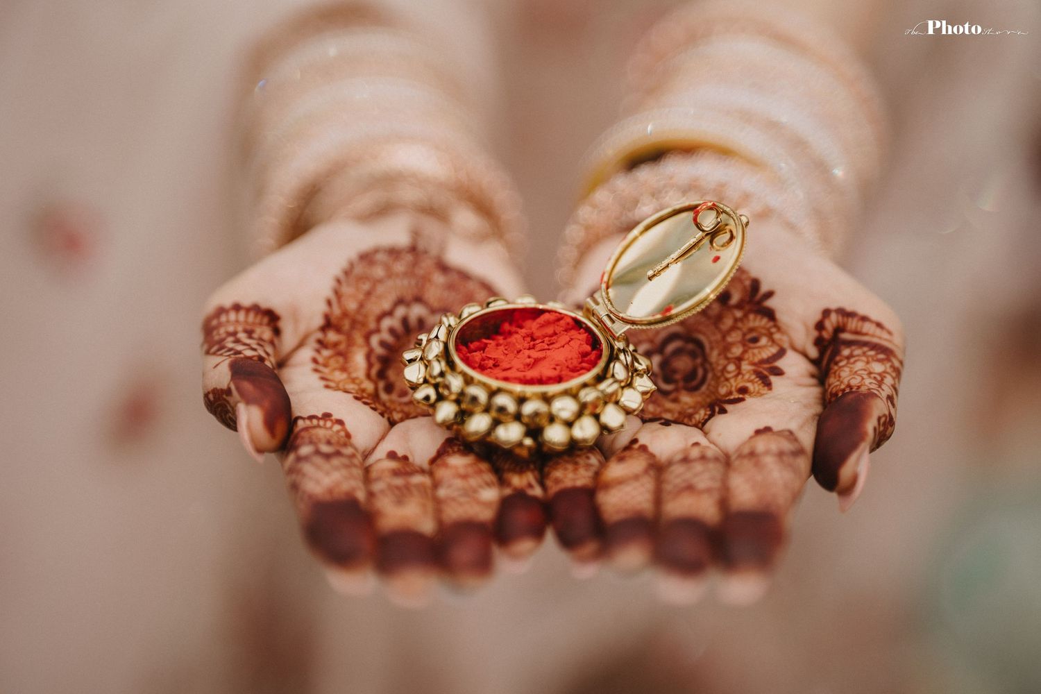 Close-up of ornate wedding jewelry and decorative elements in traditional Indian style.