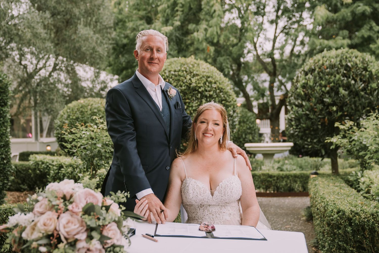 wedding couple signing register Allely estate gardens