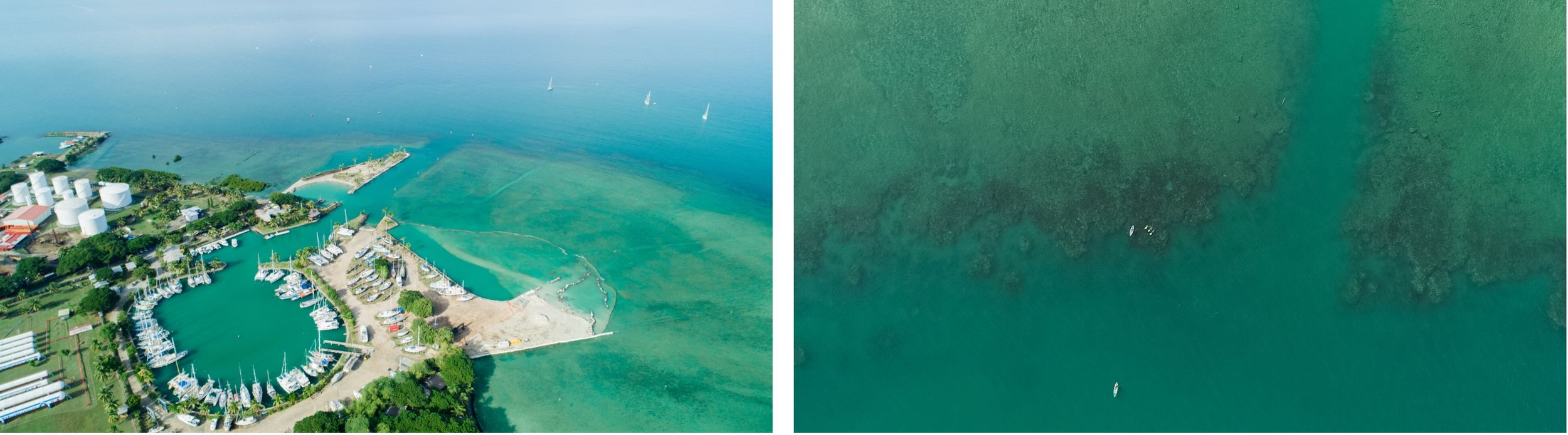 Aerial view of luxury overwater bungalows in turquoise tropical waters.