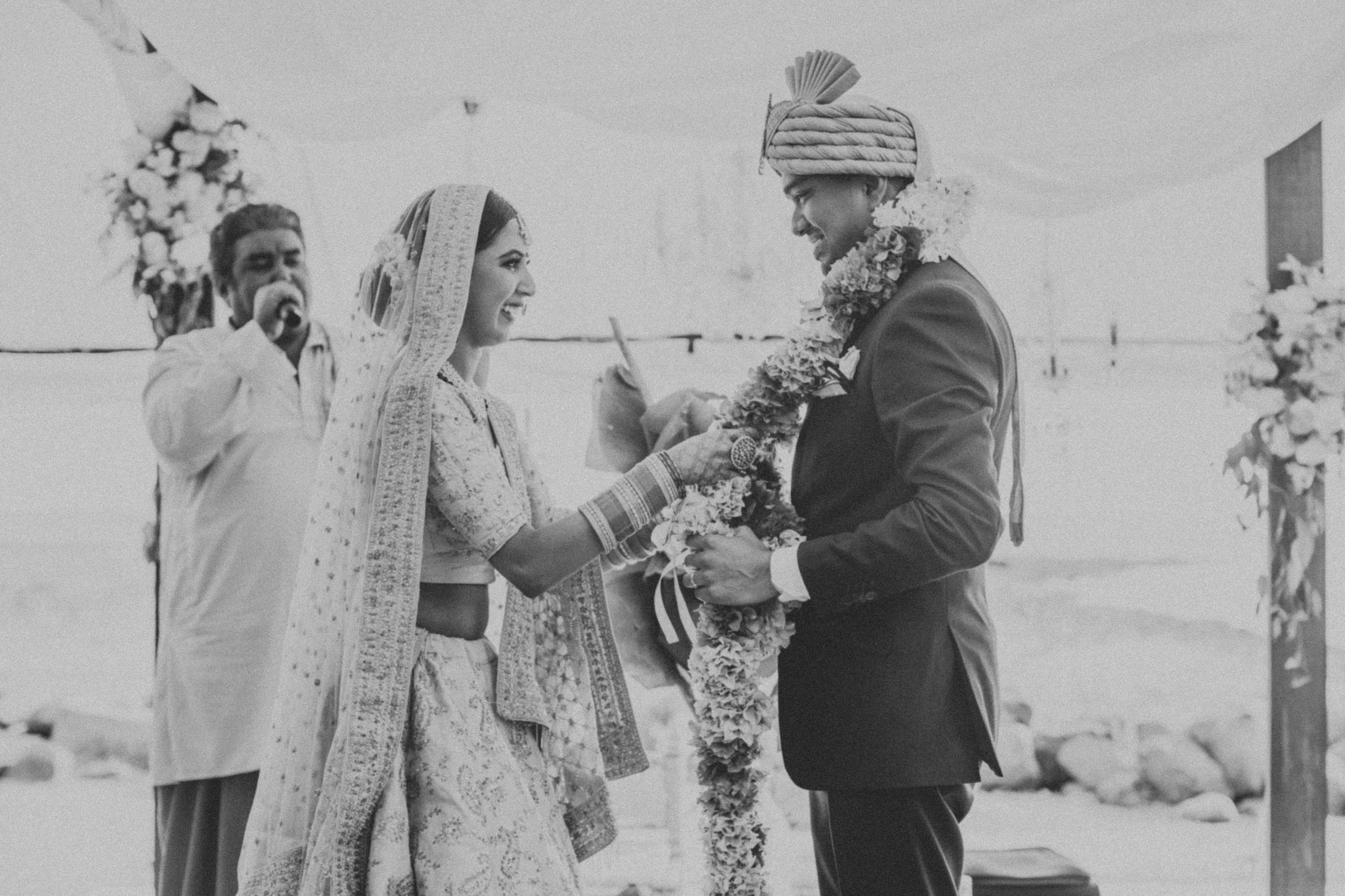 Black and white photo of a traditional Indian wedding ceremony.