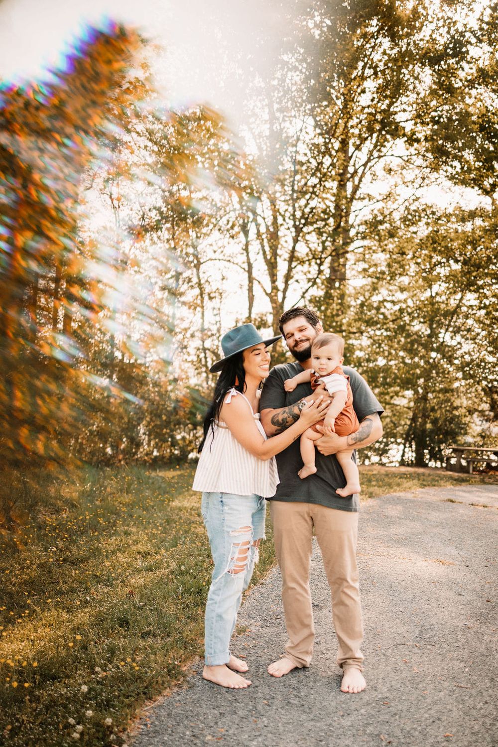 Happy family embrace during a session in Knoxville at golden hour.