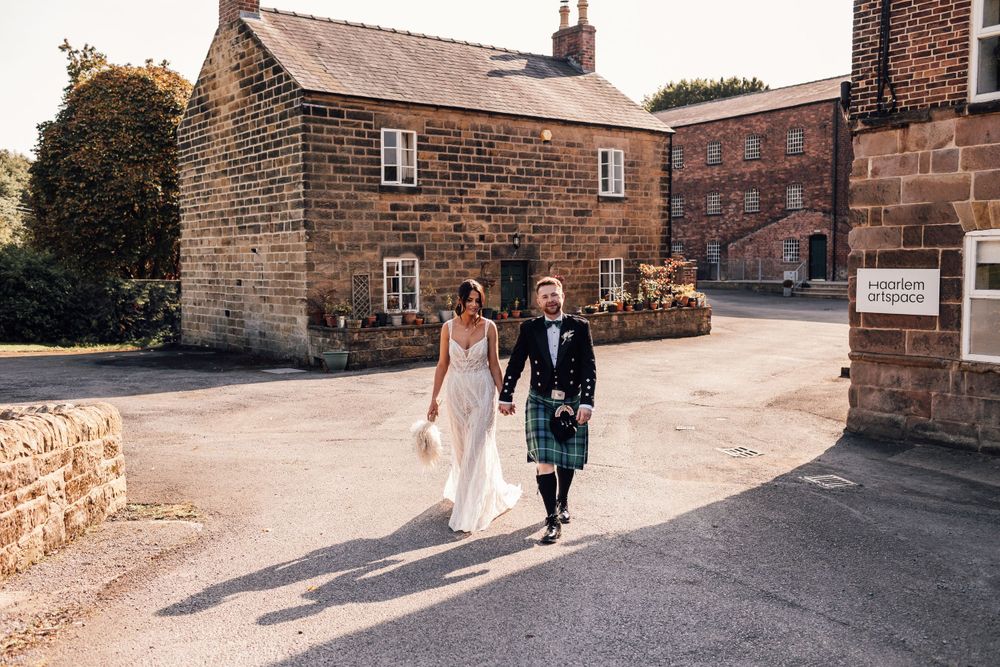 couple walking outdoors haarlem mill wedding