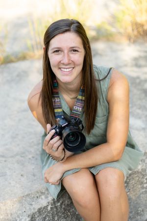 Woman with camera at Mount Bonnell in Austin, Texas