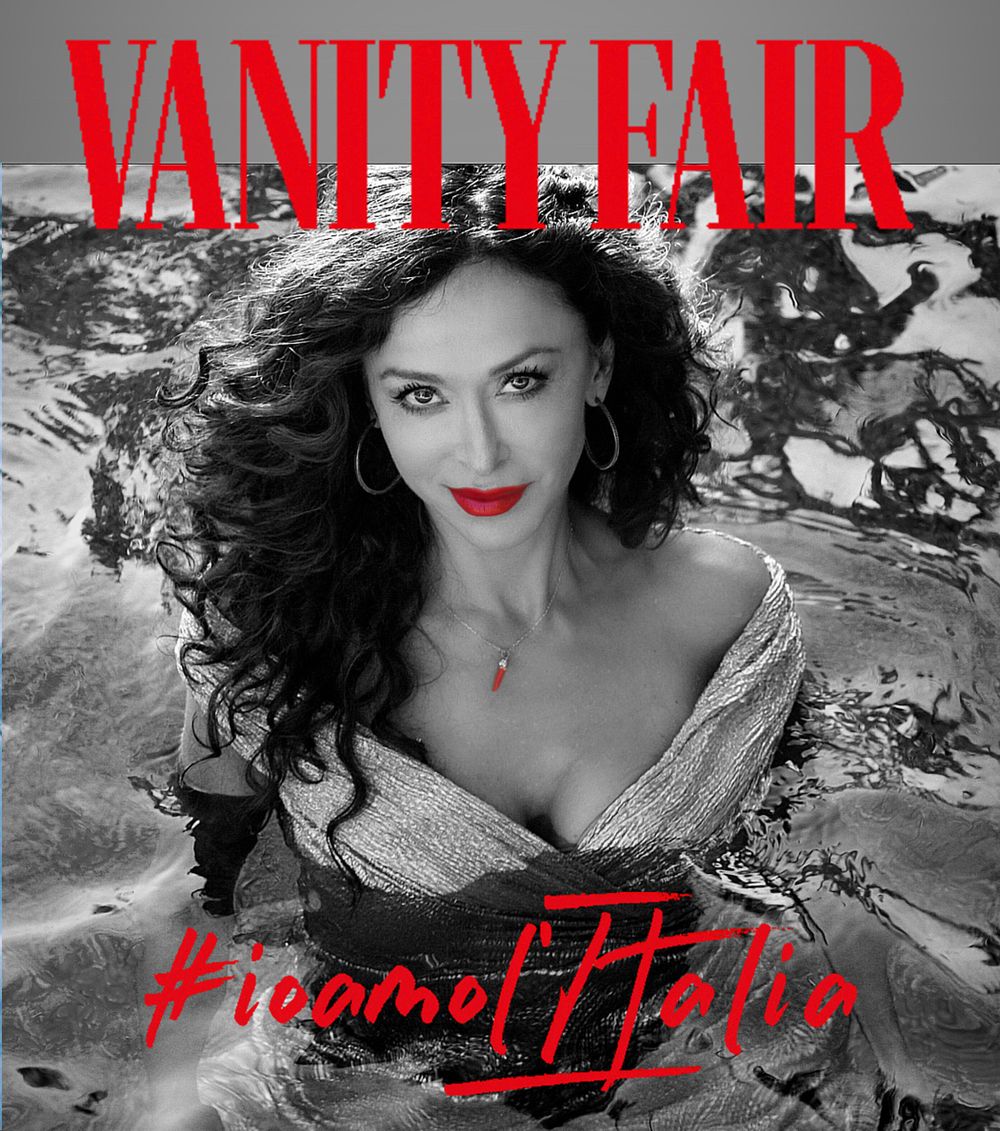 Dramatic black and white Vanity Fair magazine cover featuring stylized glamour portrait.