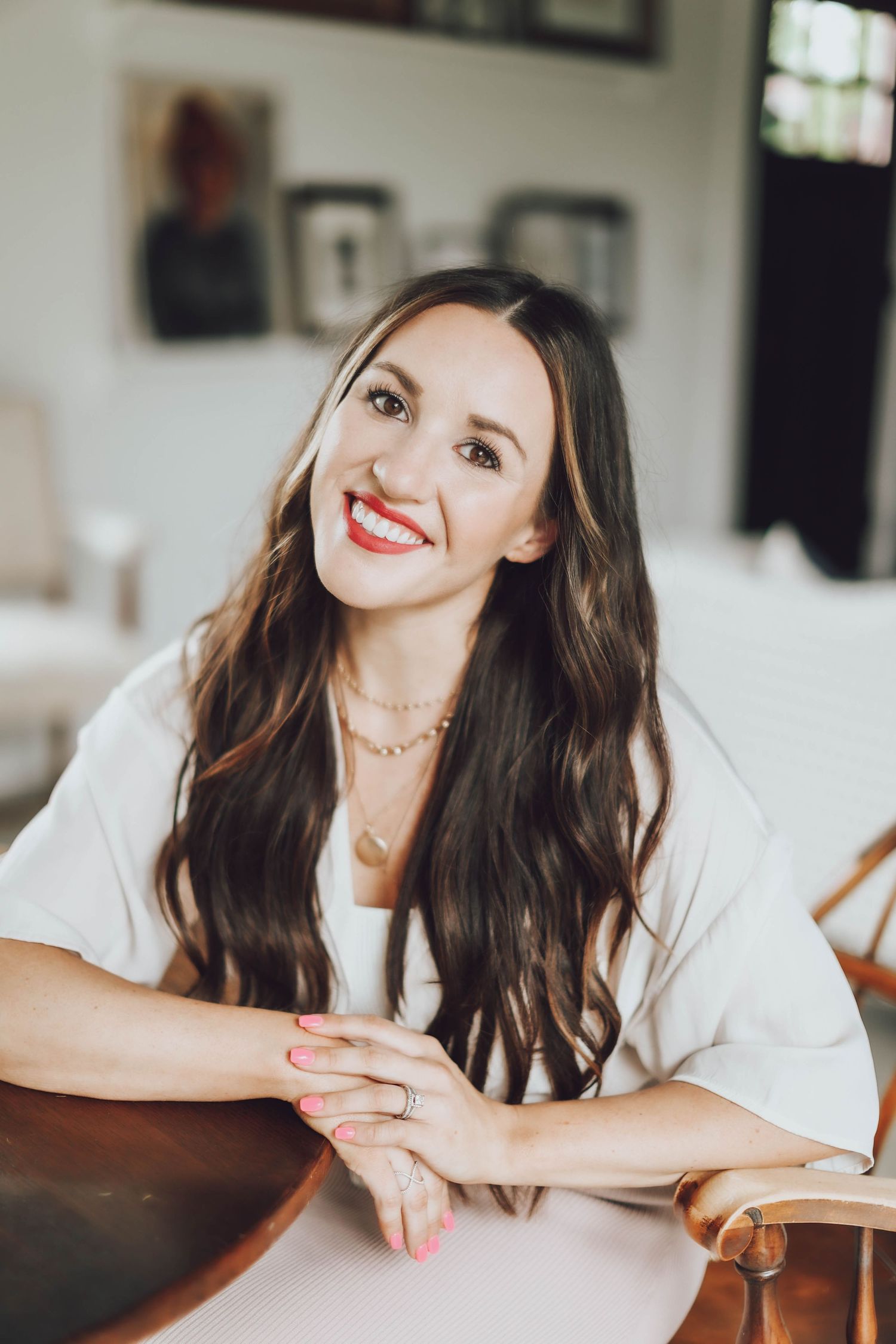 Lifestyle photography session showing casual poses on white bedding.