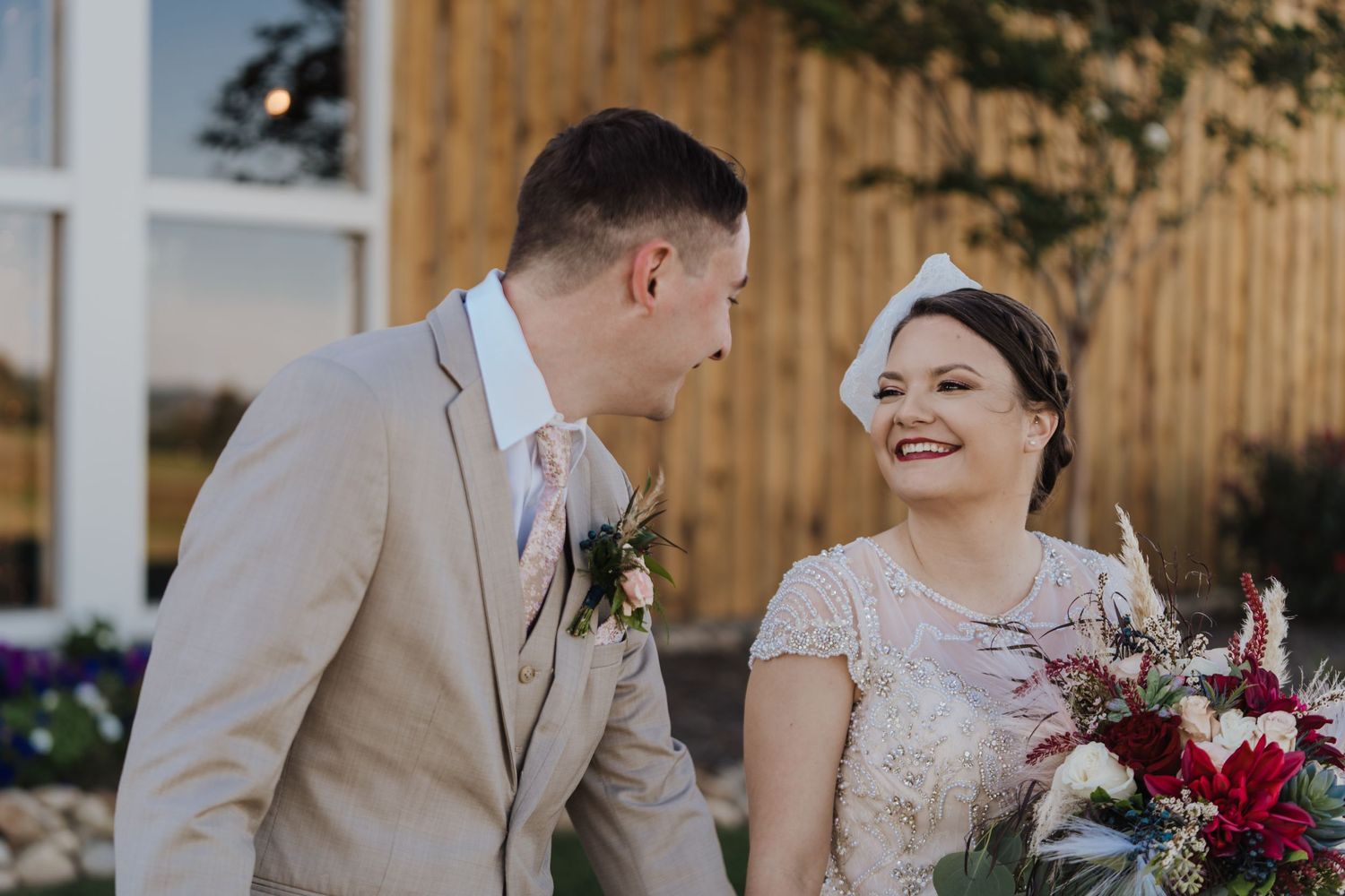 Bride and groom walking together holding hands