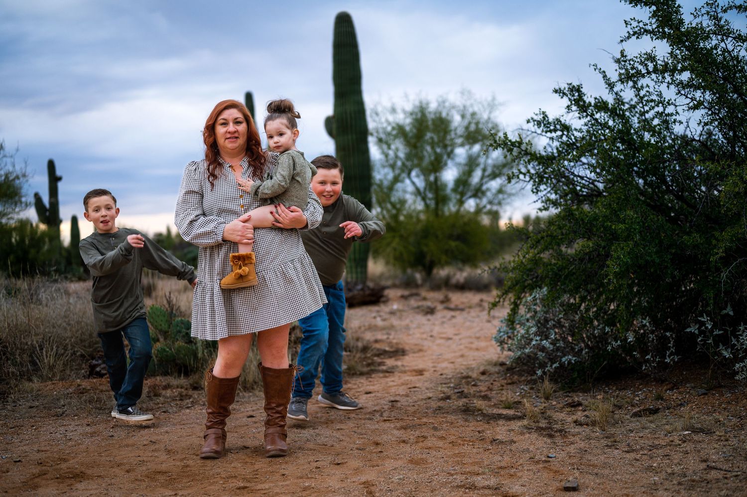 Family in desert playing together, Desert Family Photo shoot at Broadway Trailhead.