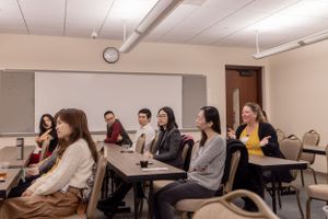Professional development session in progress with audience seated in classroom style.