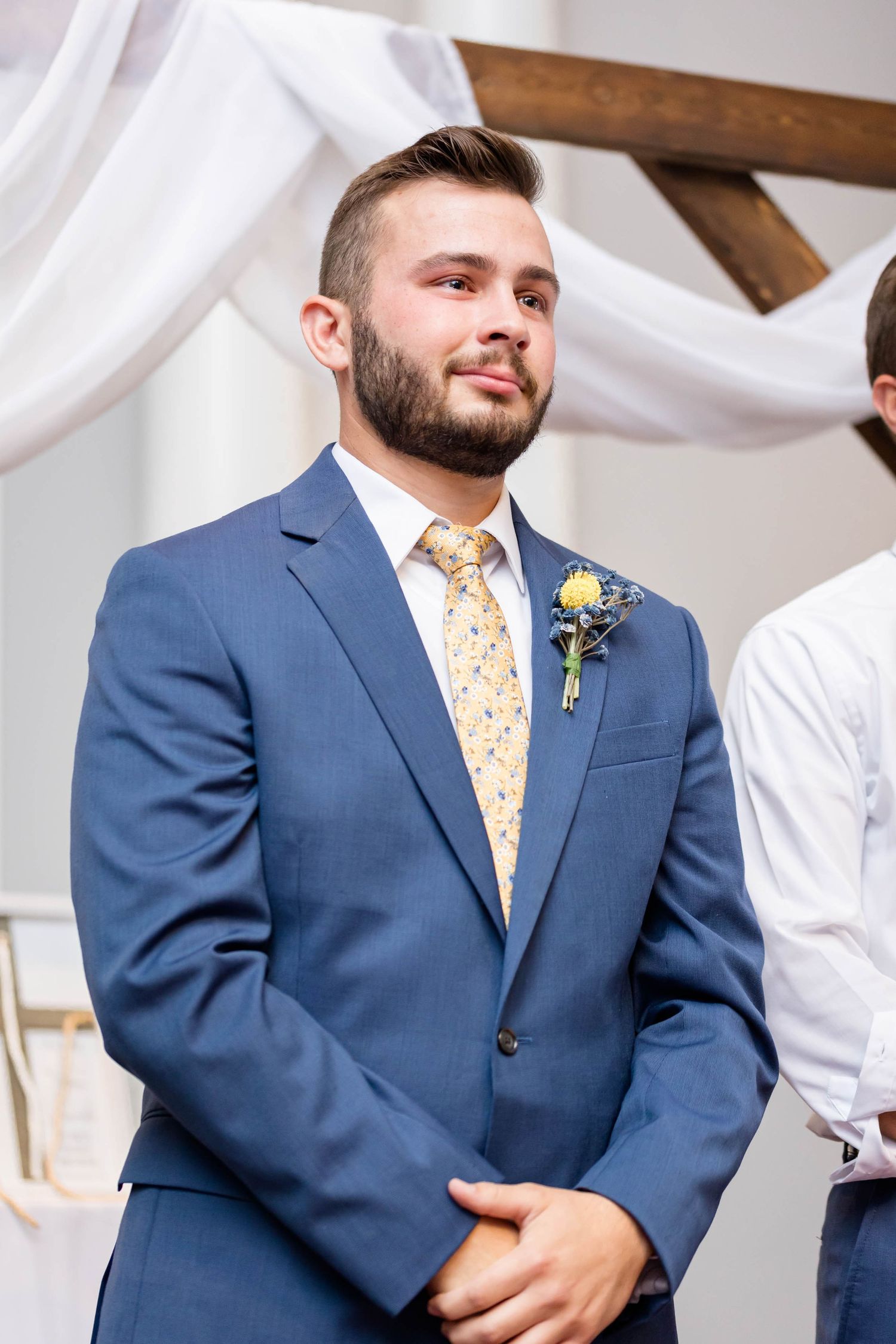 groom tears up as bride walks