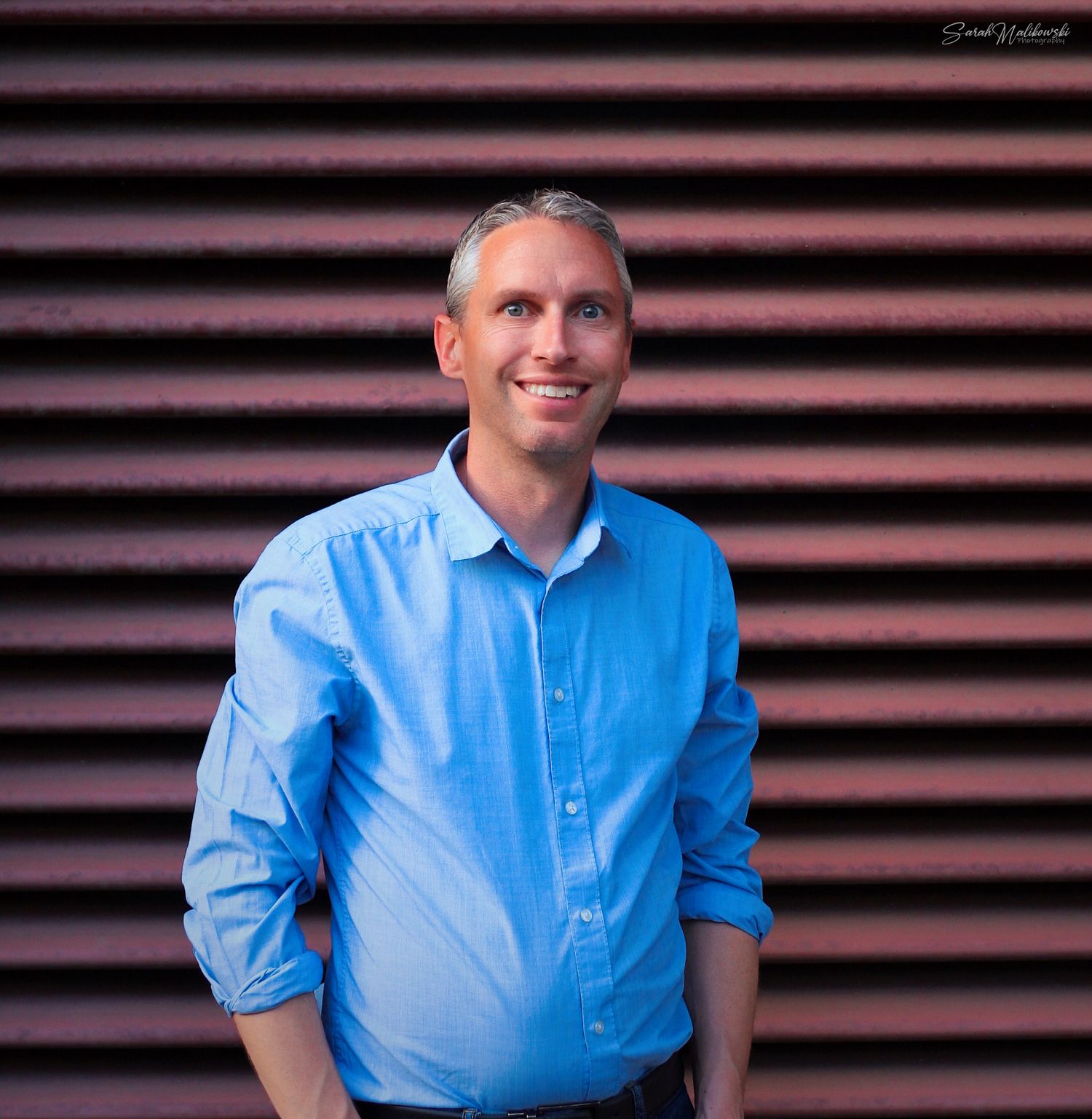 A series of casual portrait shots showing someone in a light blue collared shirt.