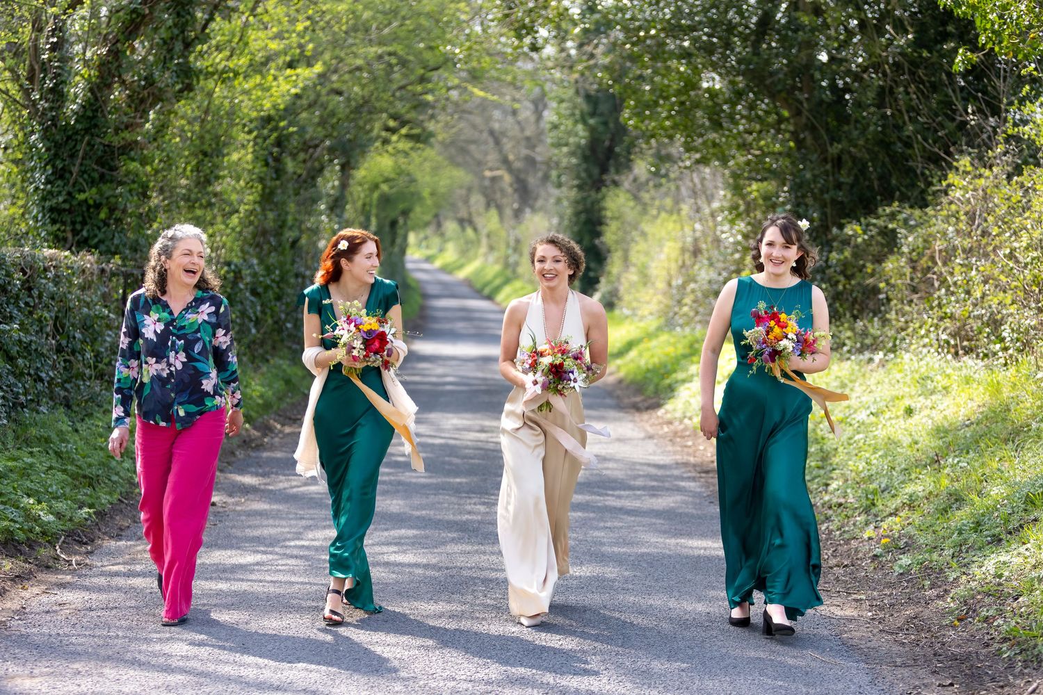 Bride, bridesmaids and mother of the bride arriving for wedding ceremony near Tidworth