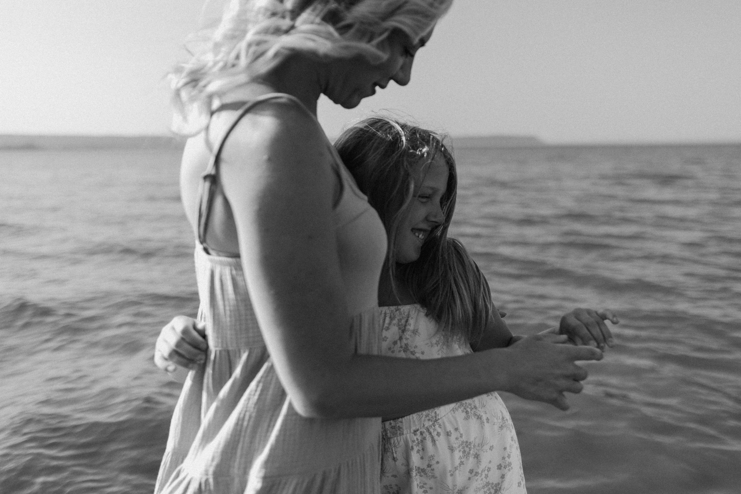 Mother-daughter family photo session at Evangeline Beach, Grand Pre, Nova Scotia