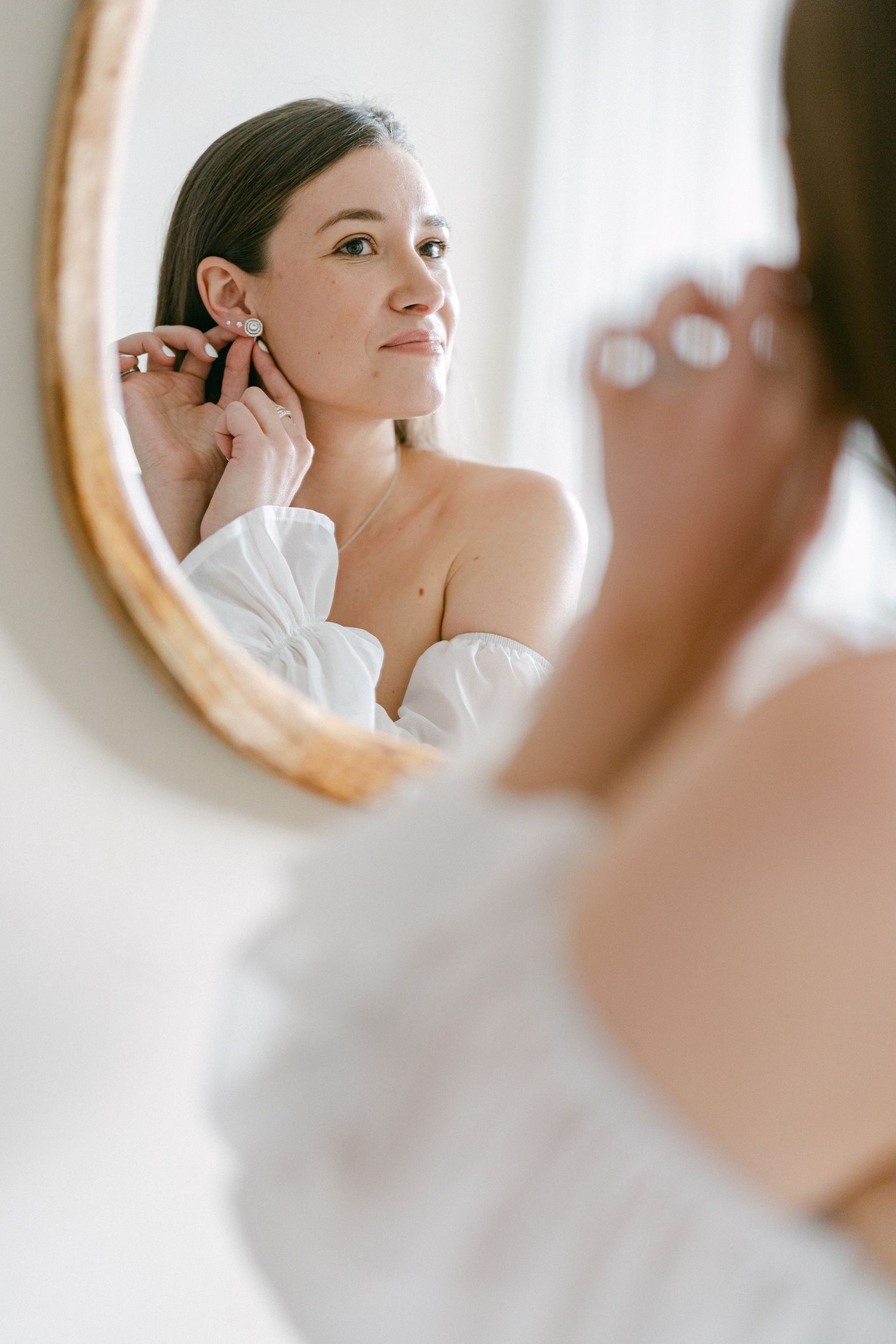 A Bride Adjusting Her Earrings