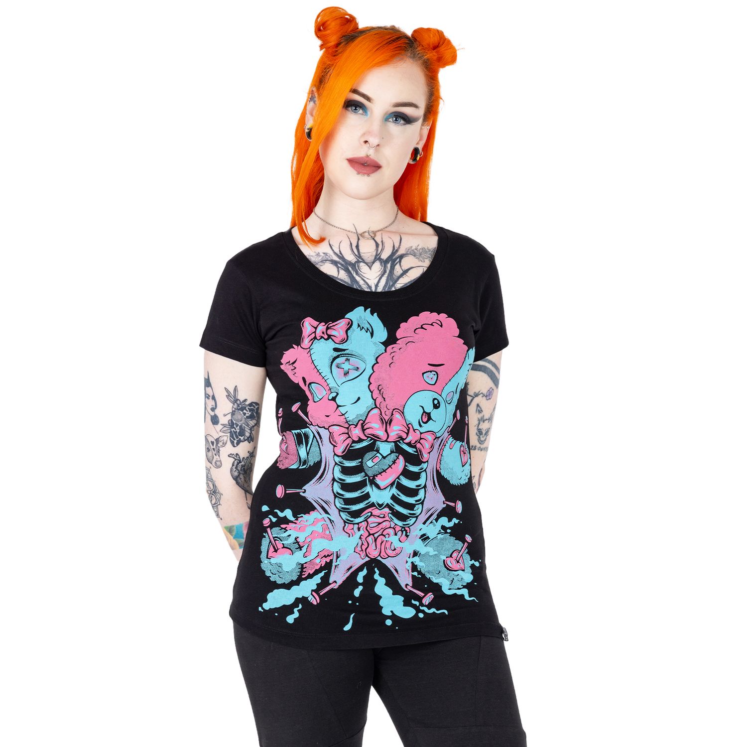 Alternative emo styled tattooed femme model with orange hair for small fashion brand in a photography studio in Hove