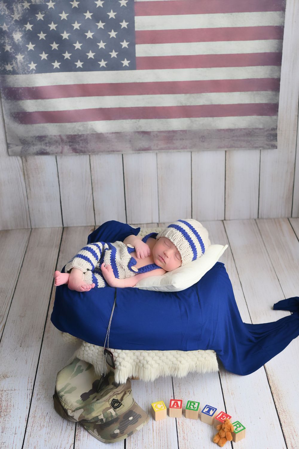 newborn baby elegantly placed for newborn girl/boy photo session