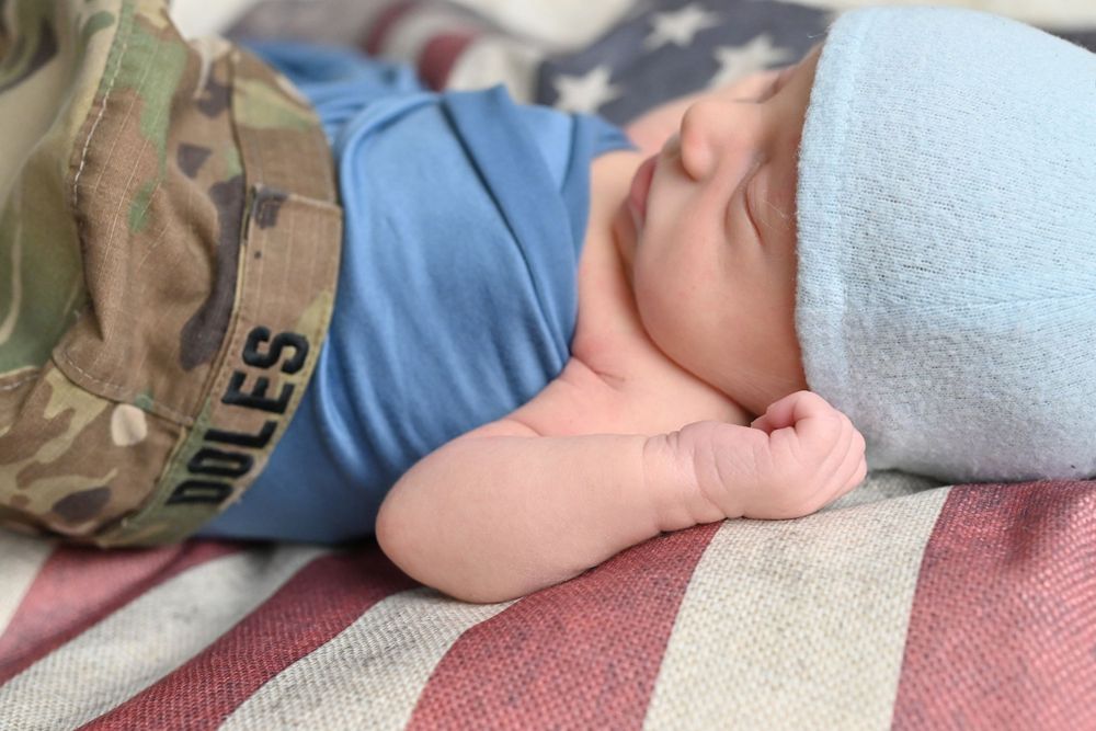 newborn baby elegantly placed for newborn girl/boy photo session