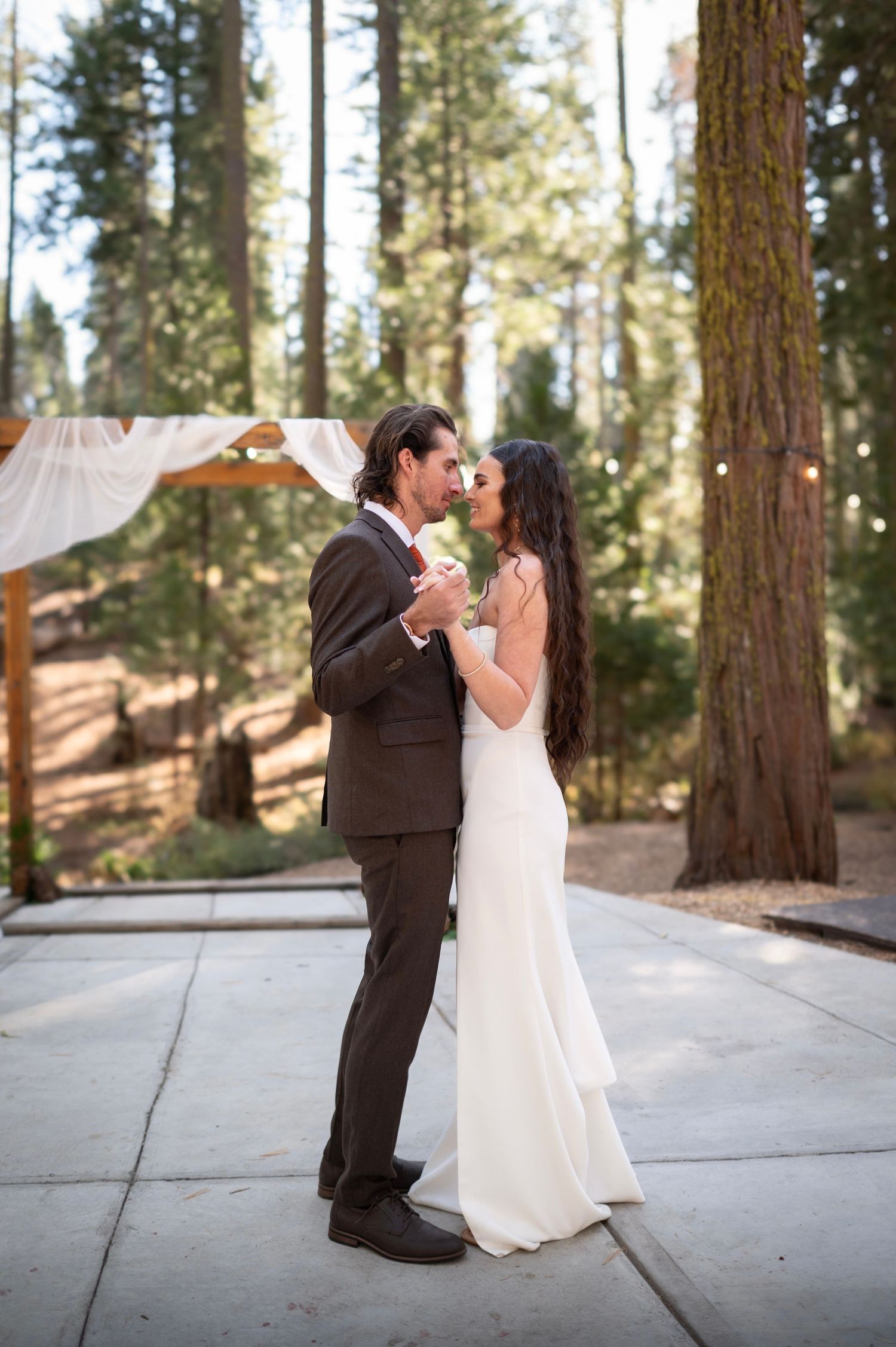 A wedding dance in the woods at the Pinecrest Chalet, in Pinecrest, California
