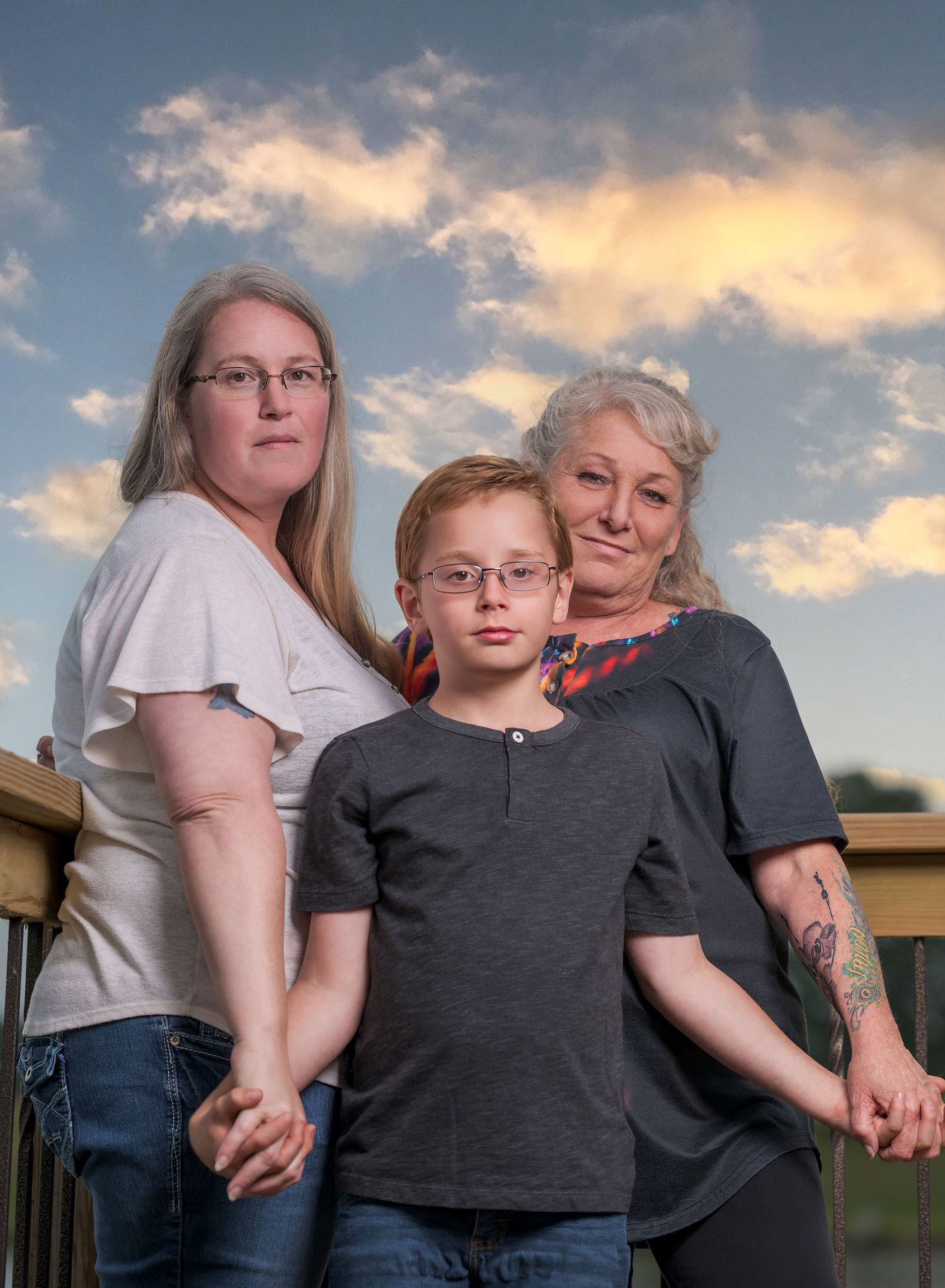 Generational family gathered at sunset — warm, story-driven Mid-Missouri photography.