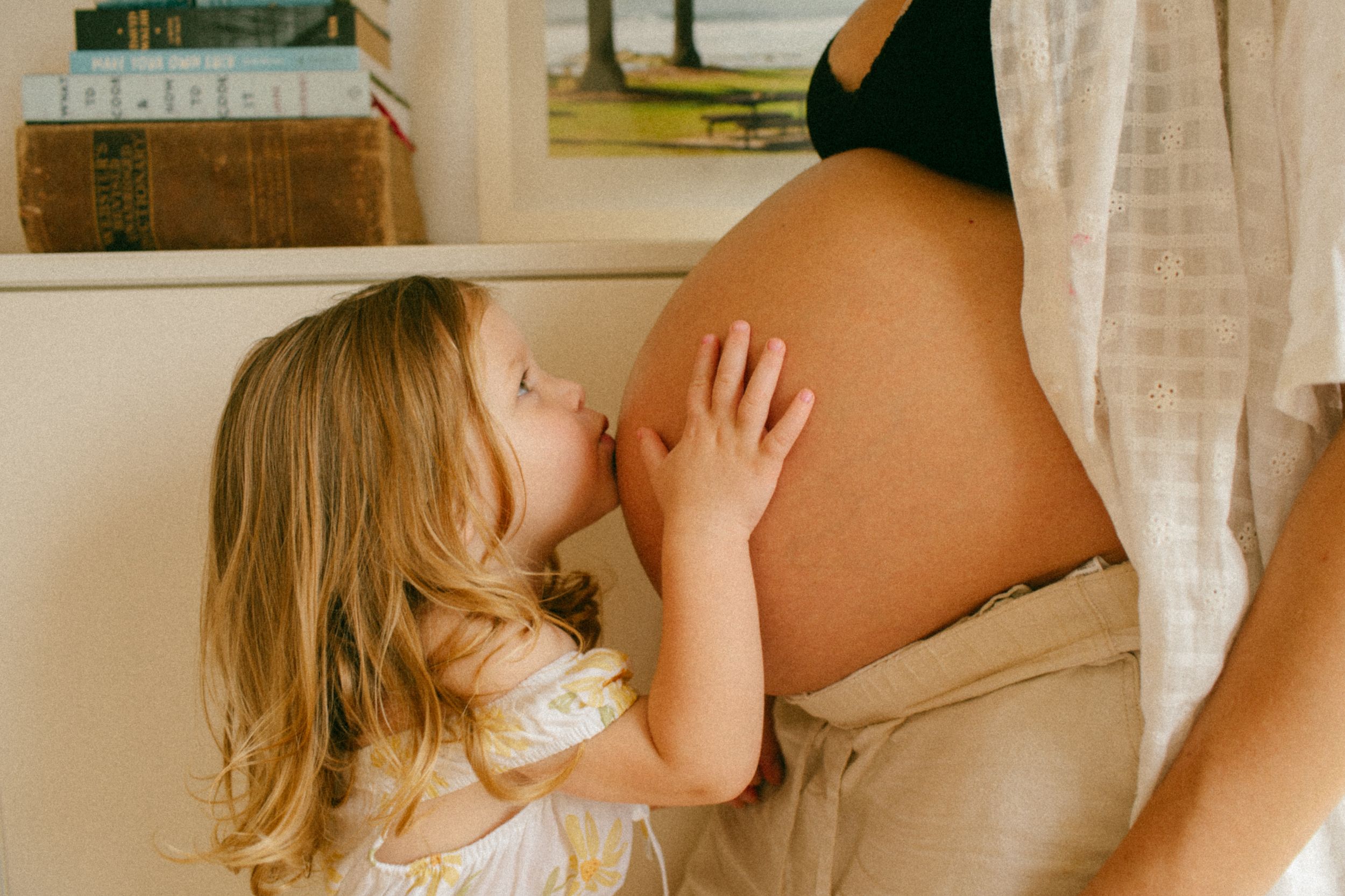 Maternity photography session with a toddler in Sydney & Northern Beaches, capturing tender, playful, and heartfelt moments between mother a