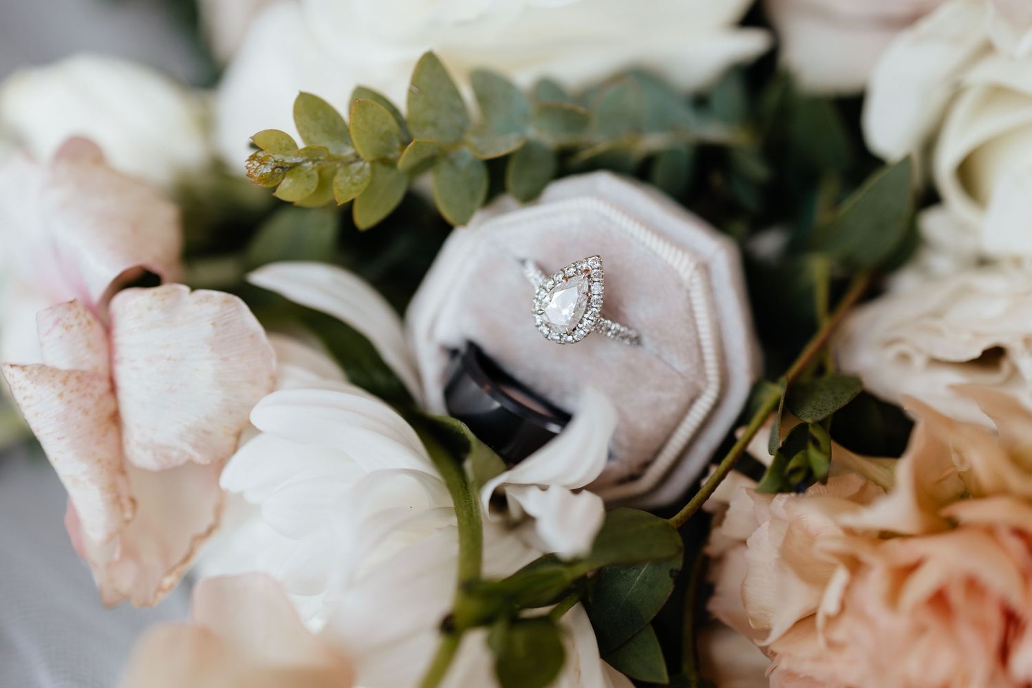 Wedding Rings in flower bouquet.