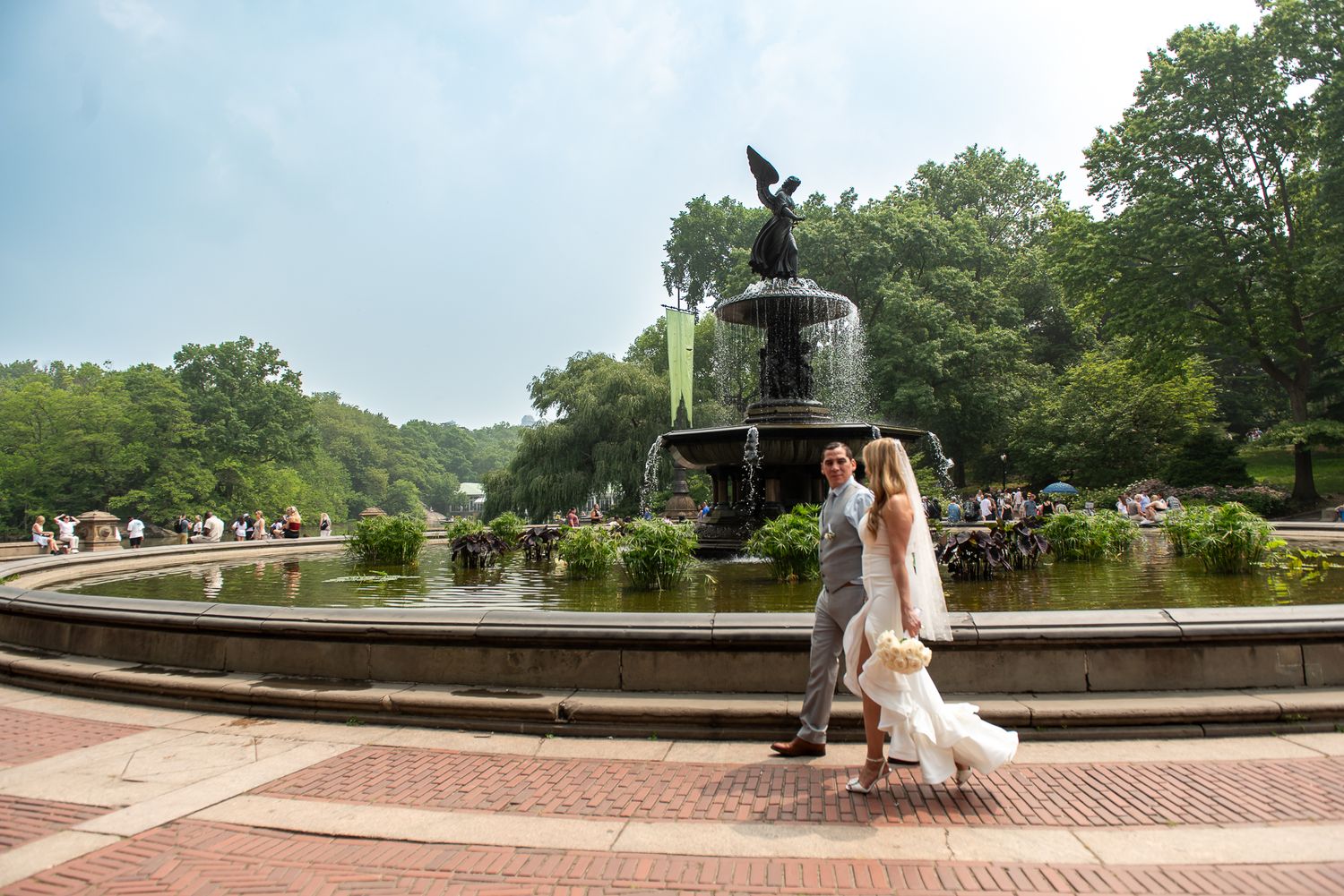 Panoramic view of Central Park's Bethesda Terrace with stone architecture and greenery.