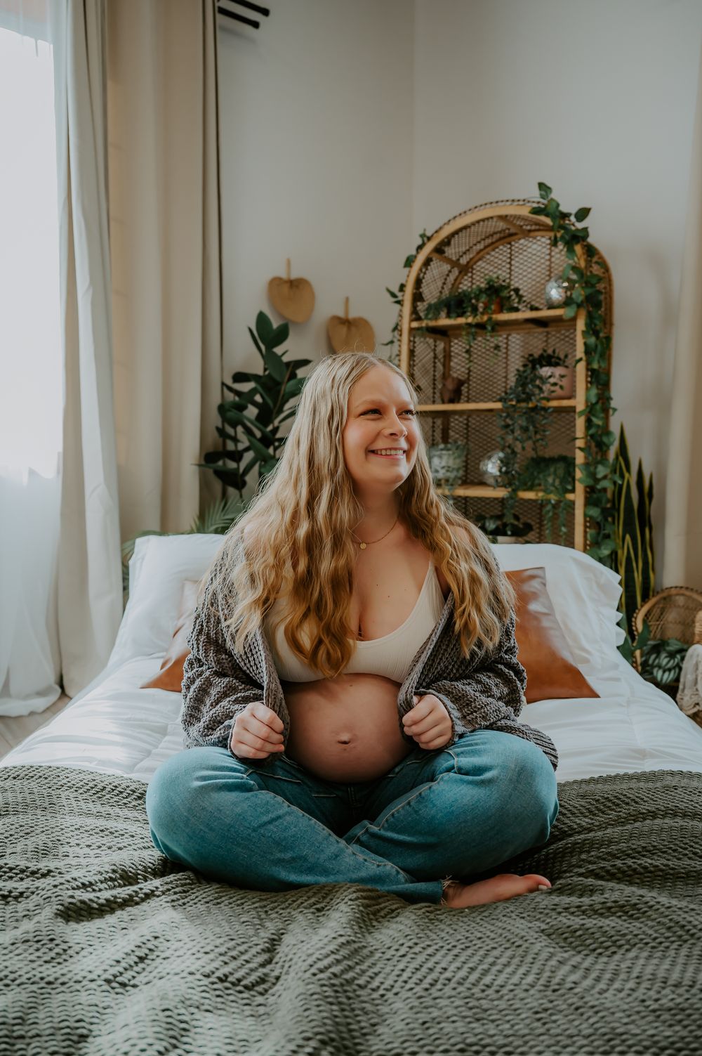 Pregnant woman on a bed