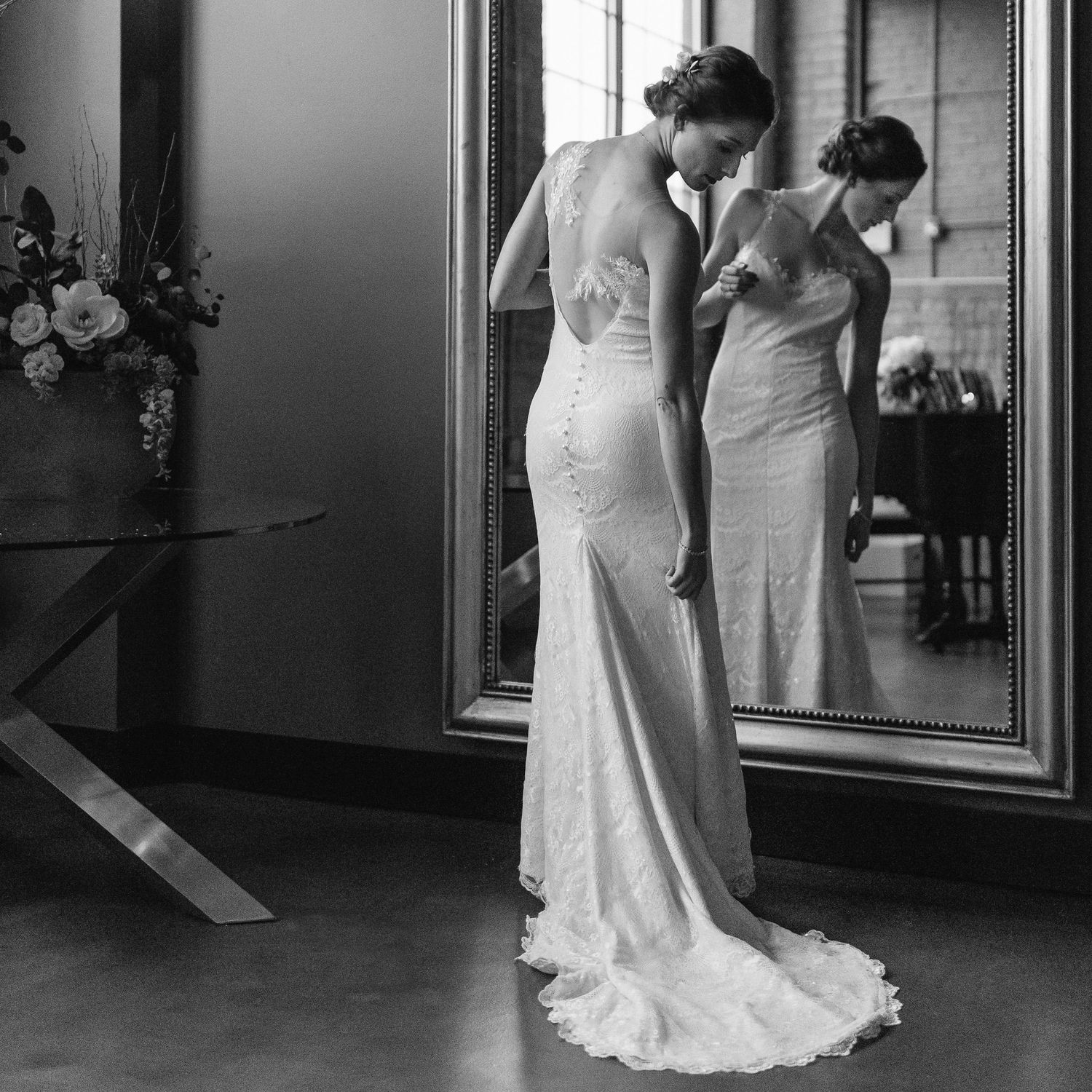 black and white timeless photo of bride getting ready at The Standard Wedding Venue in Rockford, IL