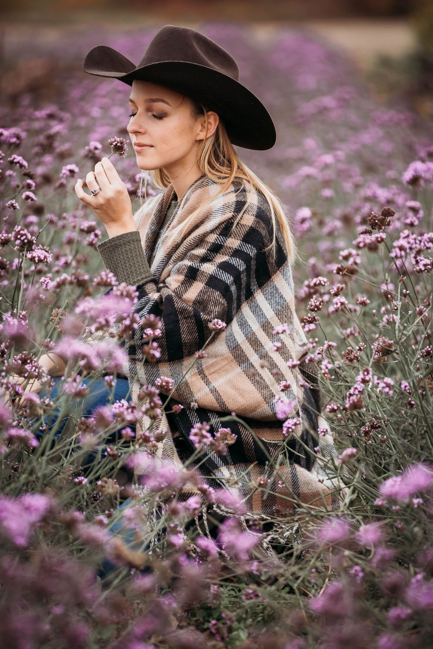 woman smelling flowers
