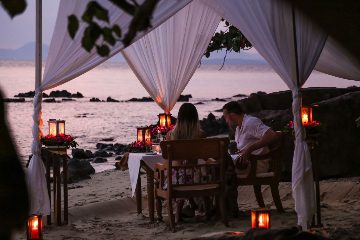 Dinner on the beach in Thailand for newly engaged Seattle couple.