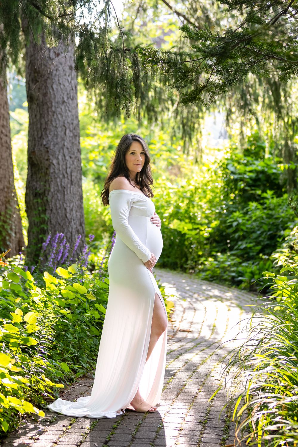 Outdoor session with pregnant mom-to-be in a stunning white maternity dress