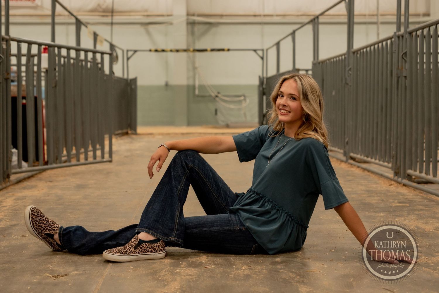 Casual lifestyle portrait in industrial setting with American flag background.