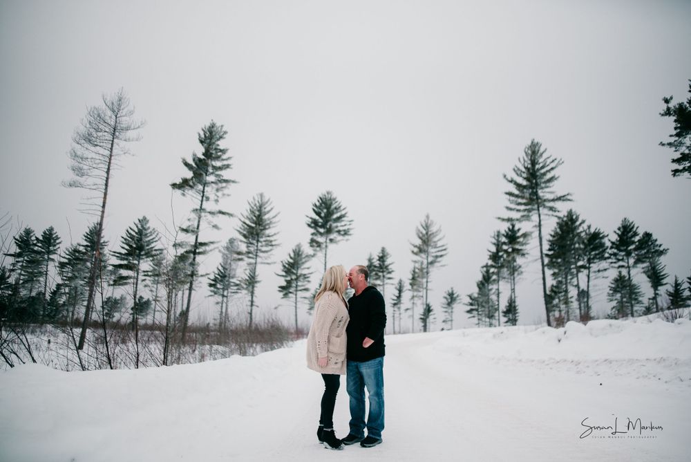 Winter scene background for a couples session in Orr, Minnesota.