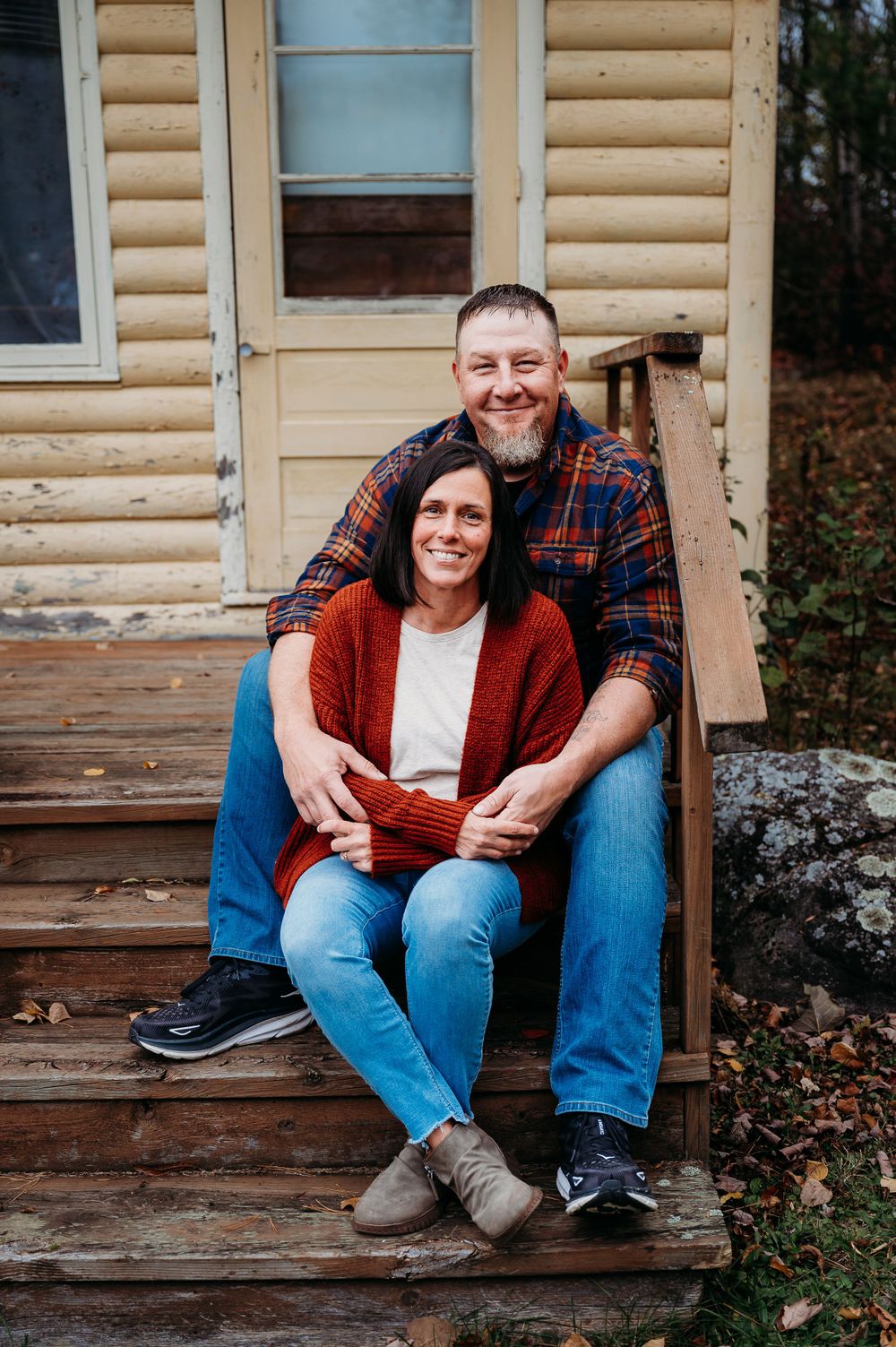 Couple posing for photographer Susan Mankus in Orr, Minnesota.
