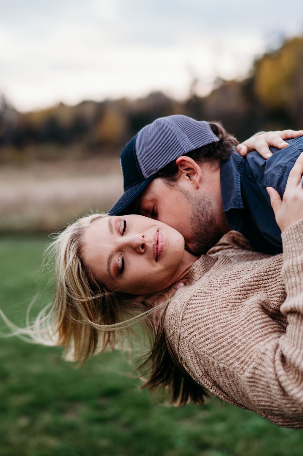 Couple engaging in spicy pose in Orr, MN.