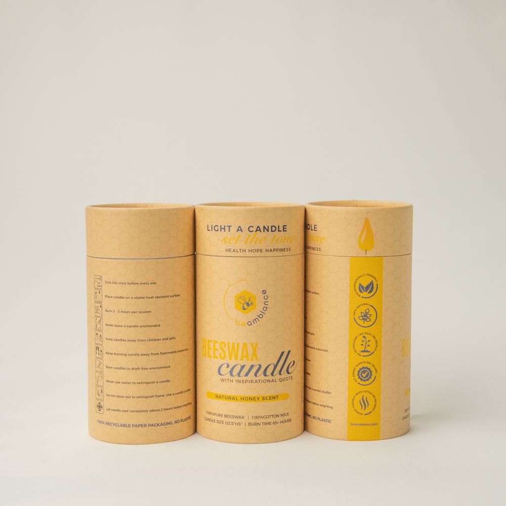 Three eco-friendly candle packaging tubes displaying product information and icons.