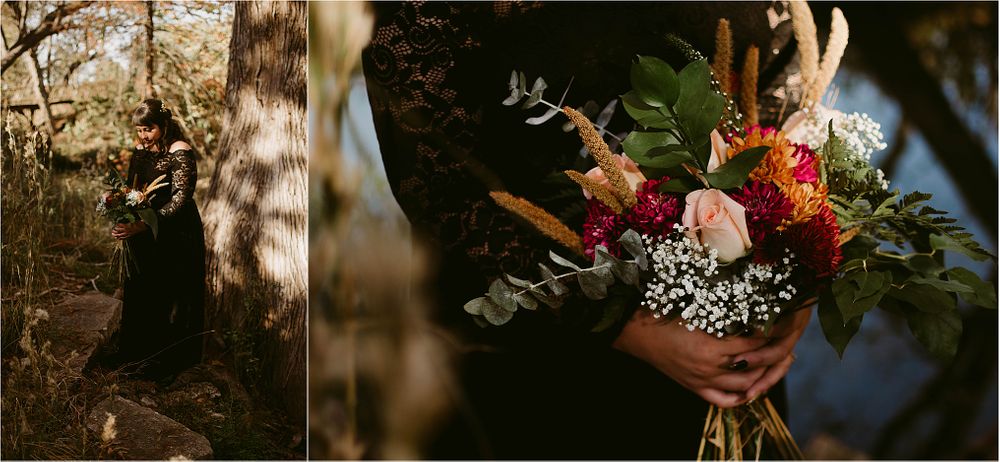 A vibrant floral bouquet with red and white blooms photographed in dramatic forest lighting.