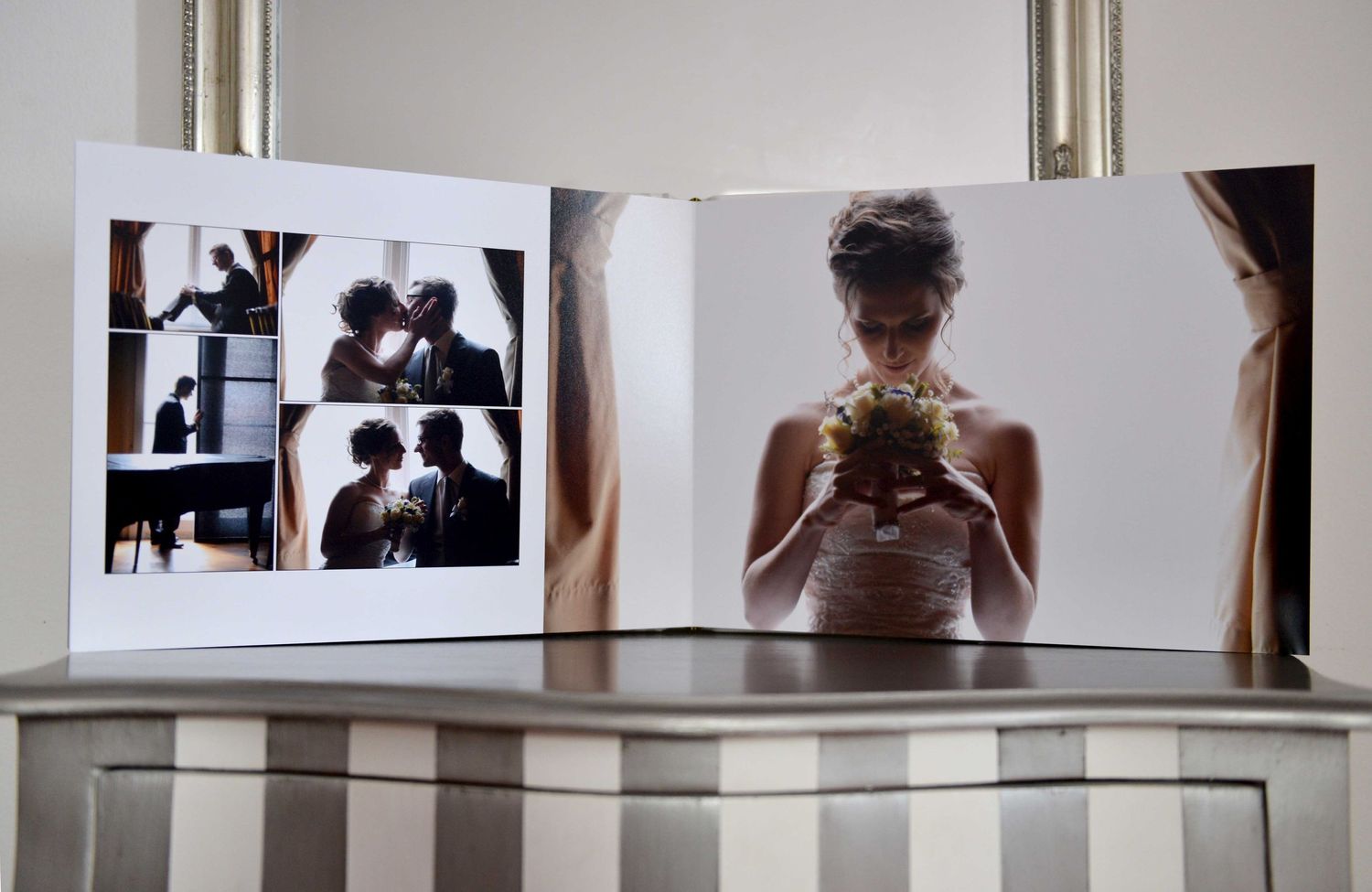 A wedding photo album displays artistic black and white portraits alongside a color image of someone holding flowers.