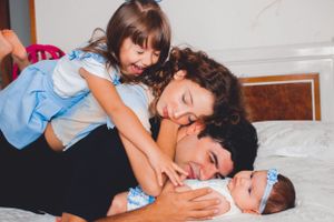 Relaxed family lifestyle session showing natural moments of connection and love.