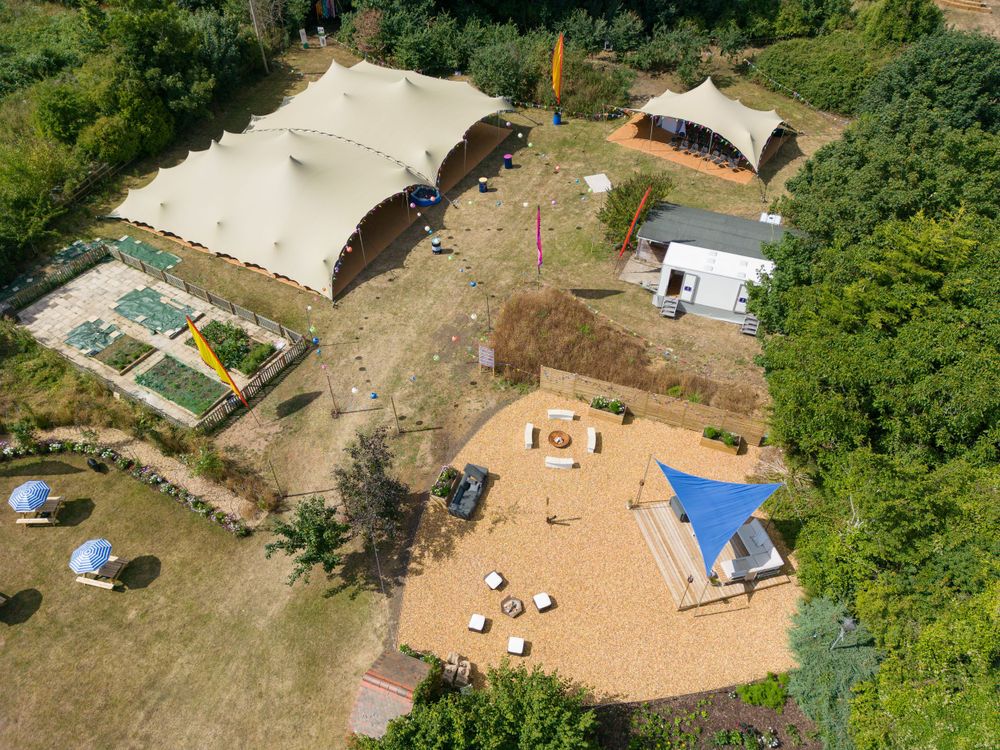 An aerial photo of the layout of a music festival themed wedding.