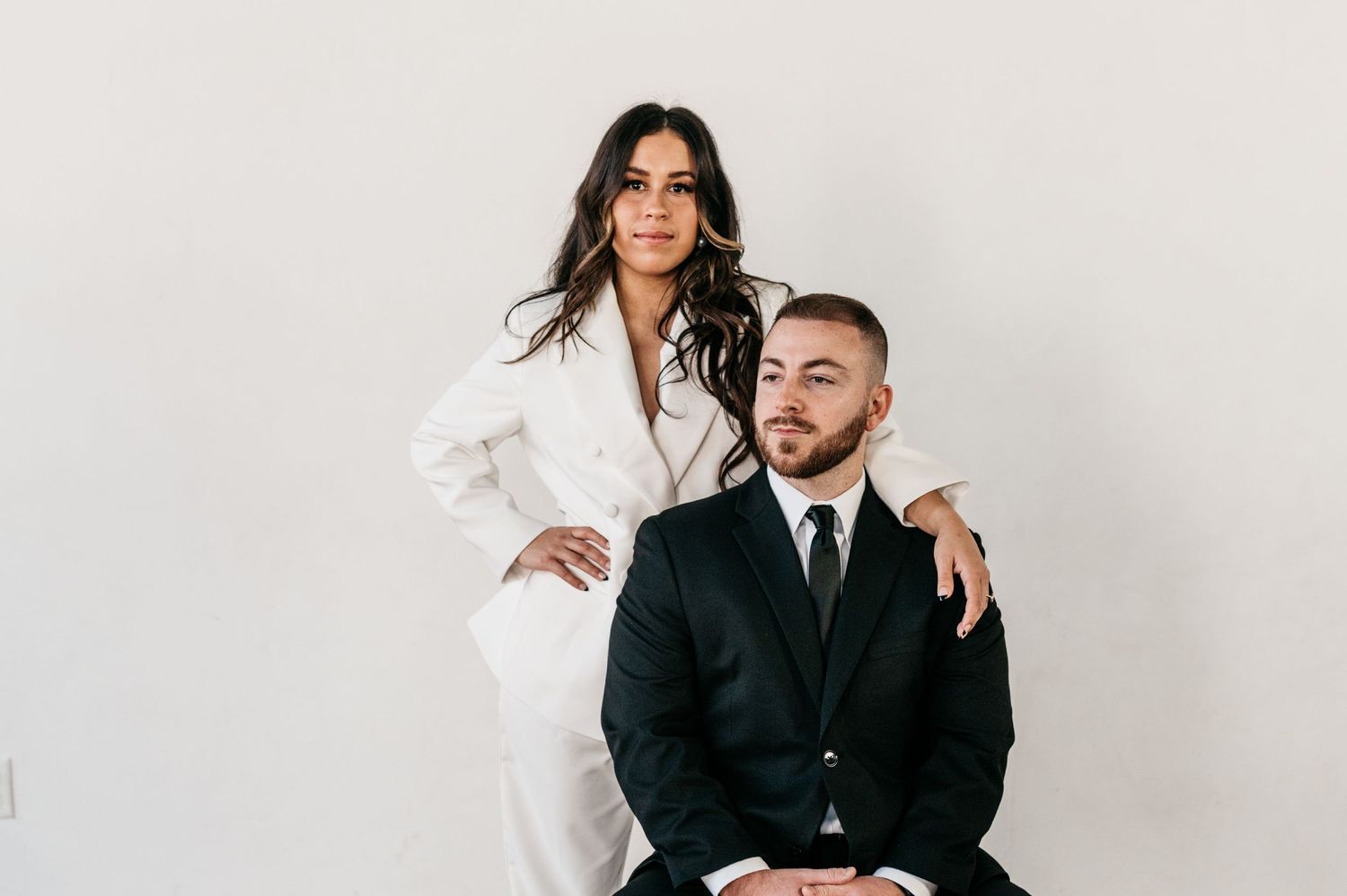 Engaged man and woman in Houston photography studio.