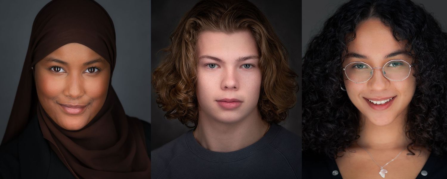Professional headshots of diverse women against dark background in studio lighting.