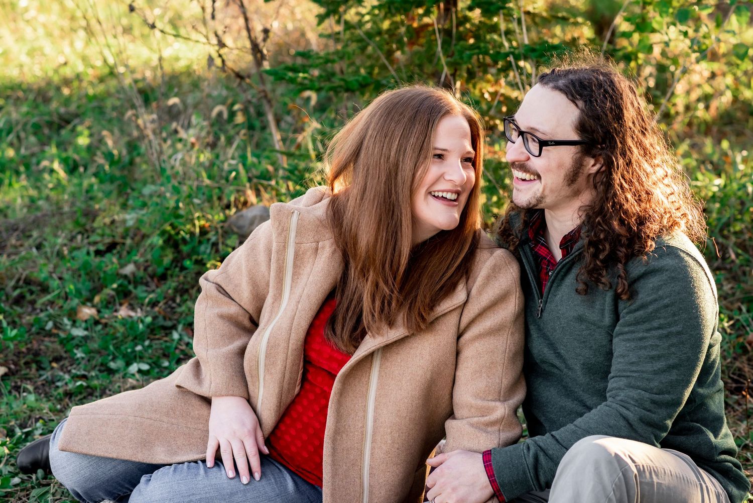 maternity couple sunset laughing golden light first baby photo