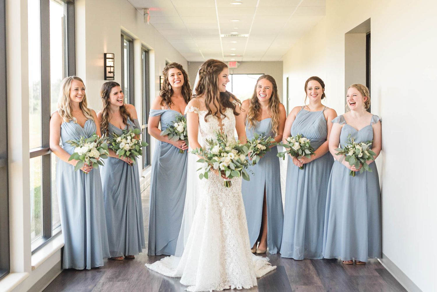Smiling and laughing bride and bridesmaids