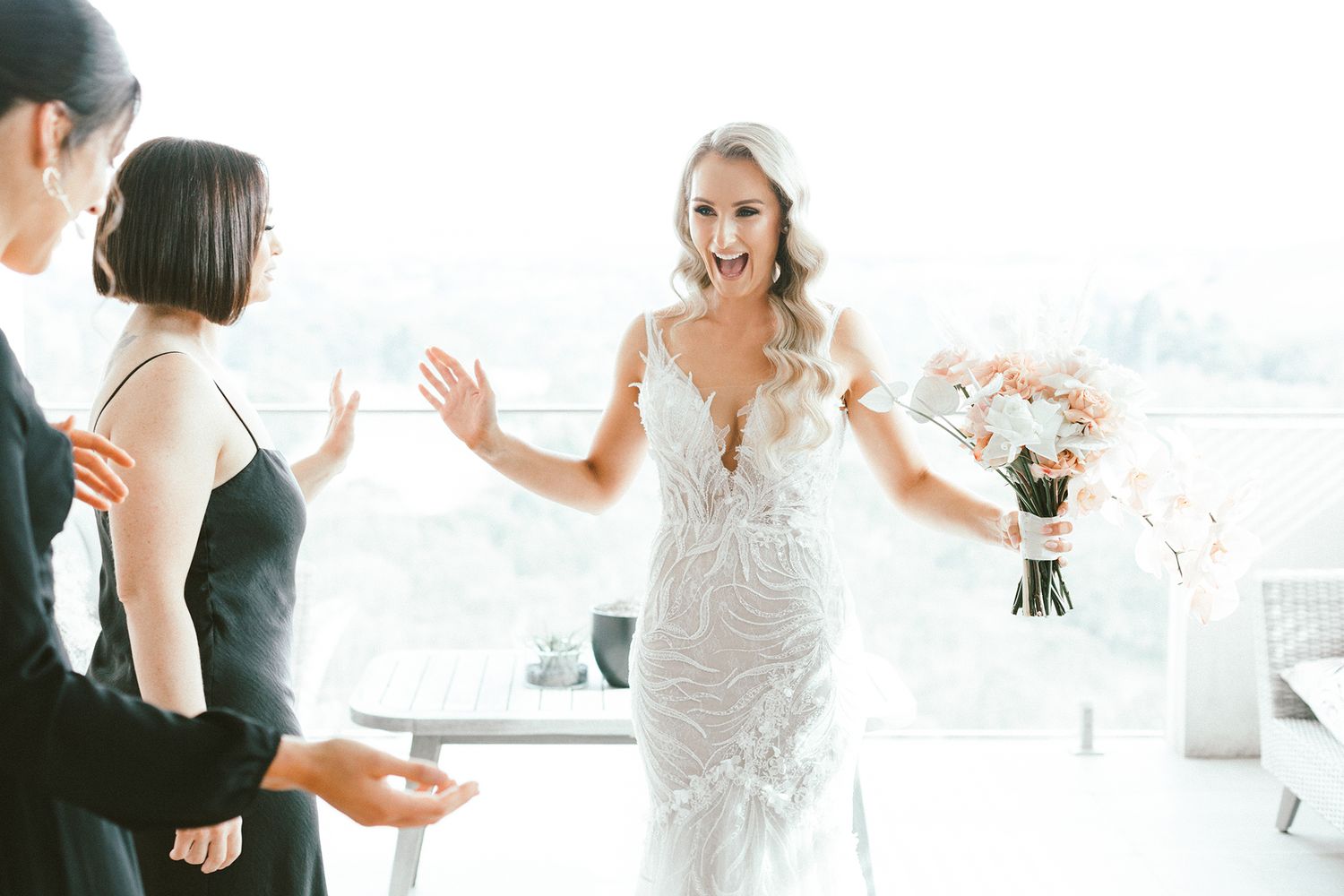 Wedding day preparation scene in a bright, contemporary living space.