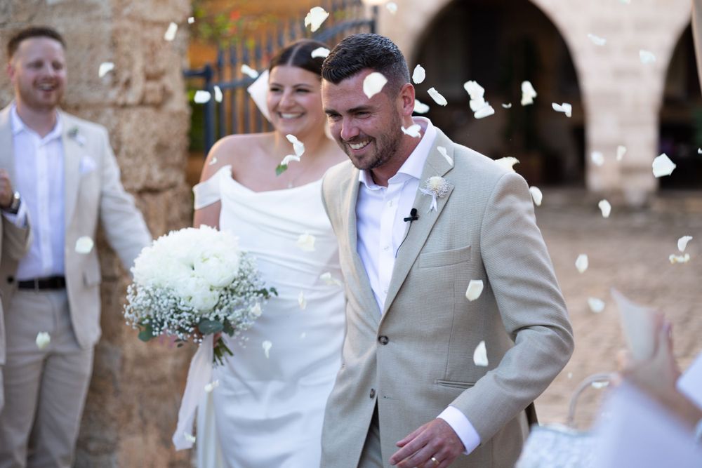 Bride and groom with confetti