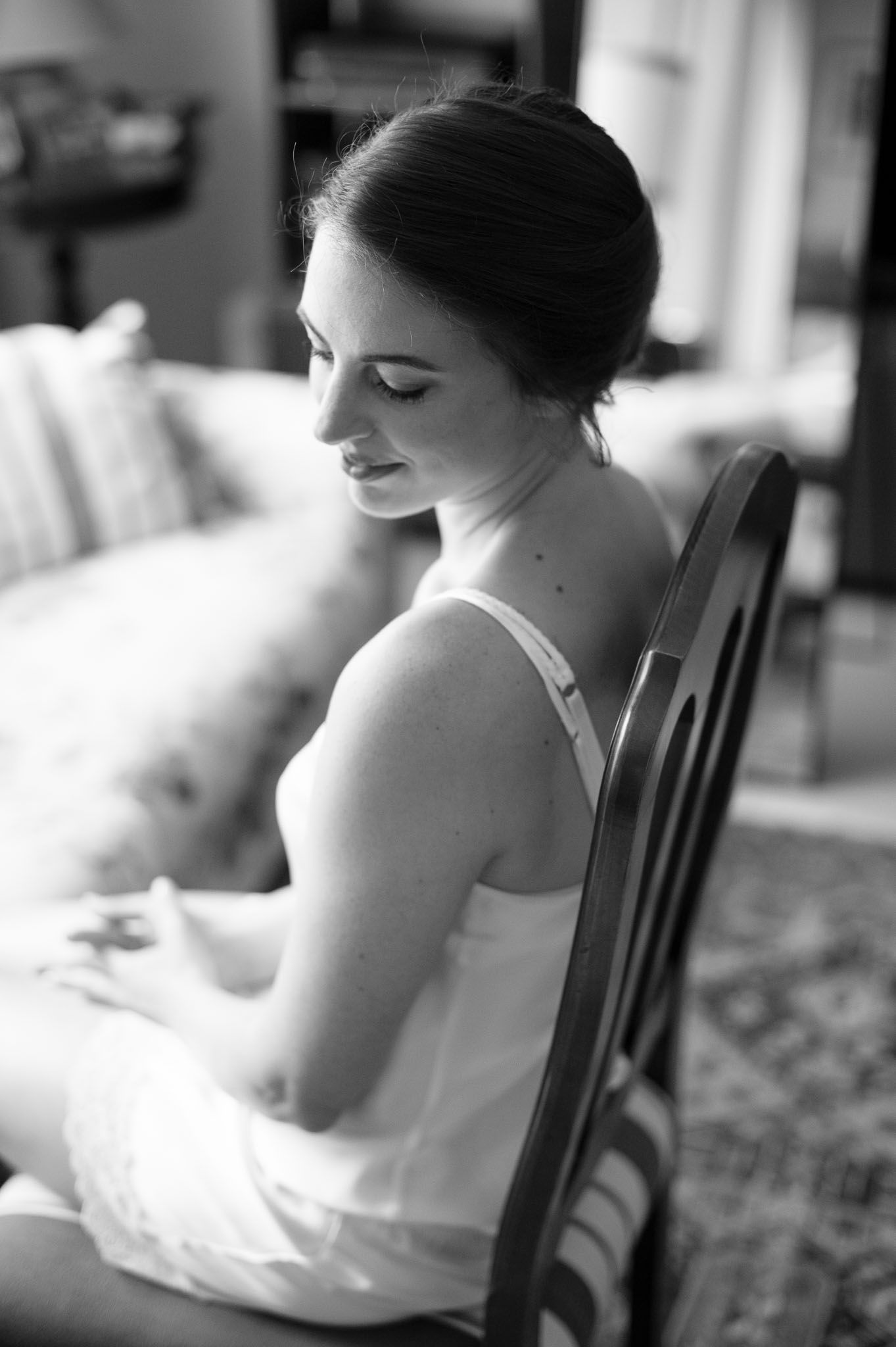 Elegant black and white portrait showing quiet contemplation before the ceremony.