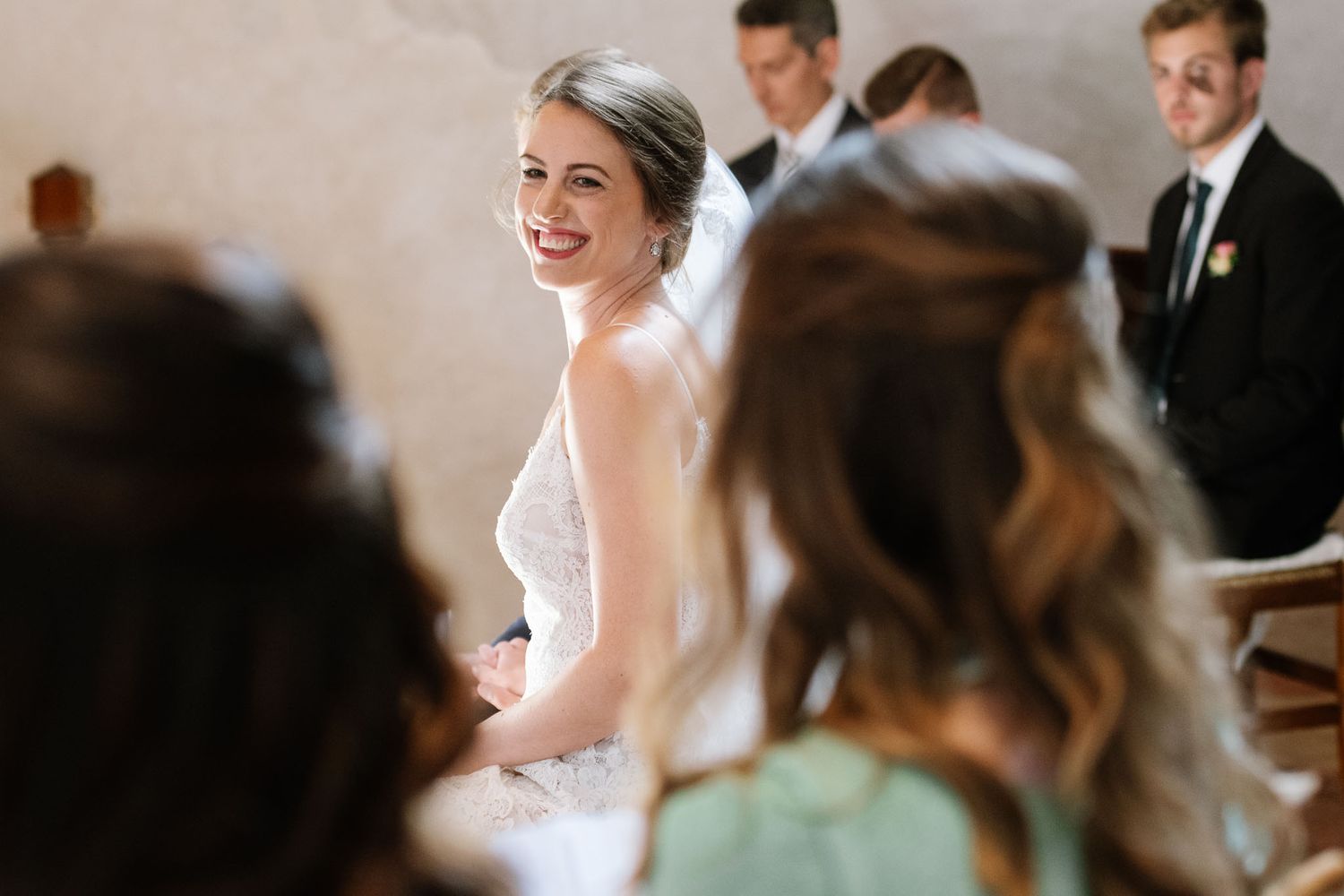 Wedding celebration inside historic church with elegant decor.