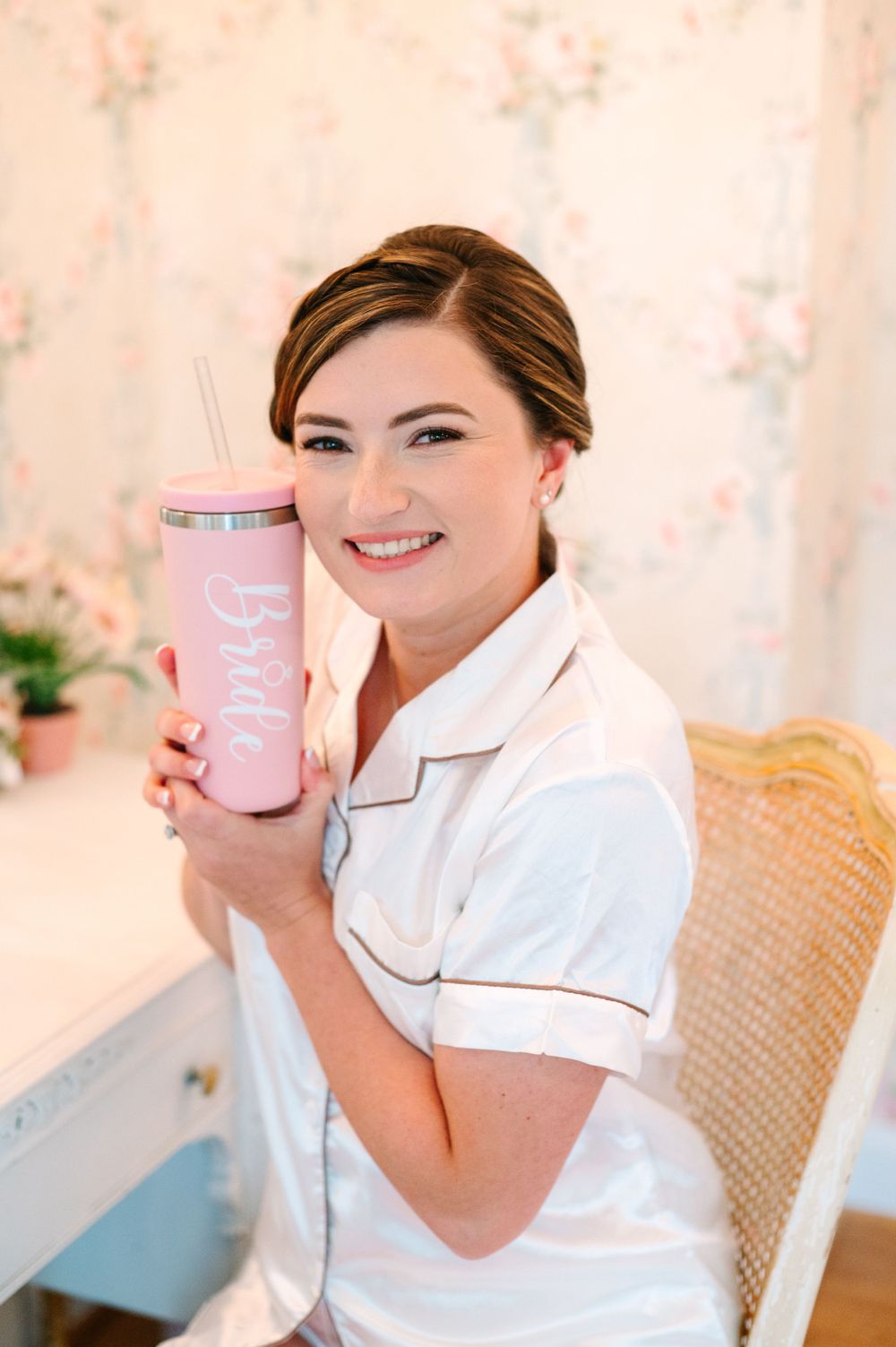 Several images showing matching white satin robes and pink beverages in a bright setting.