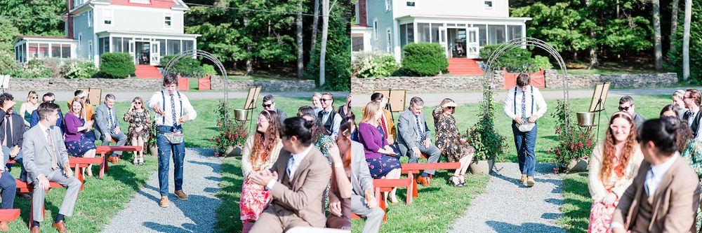 Wedding guests seated on lawn watching outdoor ceremony proceedings.