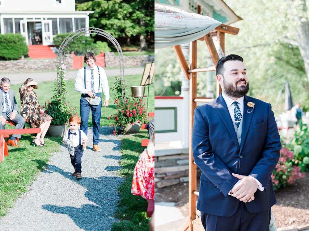 Wedding processional under floral arch and groom waiting at rustic outdoor venue.